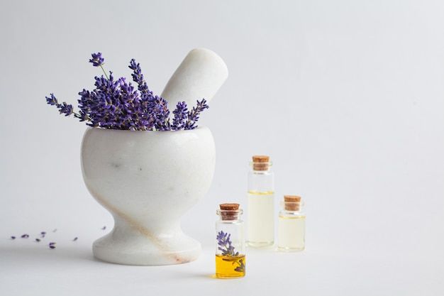 Essential oil diffuser with lavender flowers.